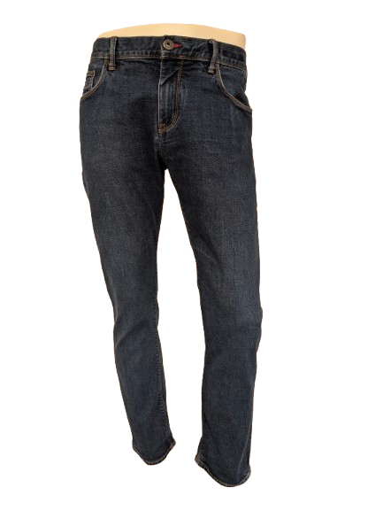 Tommy Hilfiger jeans. Donker Blauw gekleurd. Maat W36 - L32. Bleecker stretch / slim fit.