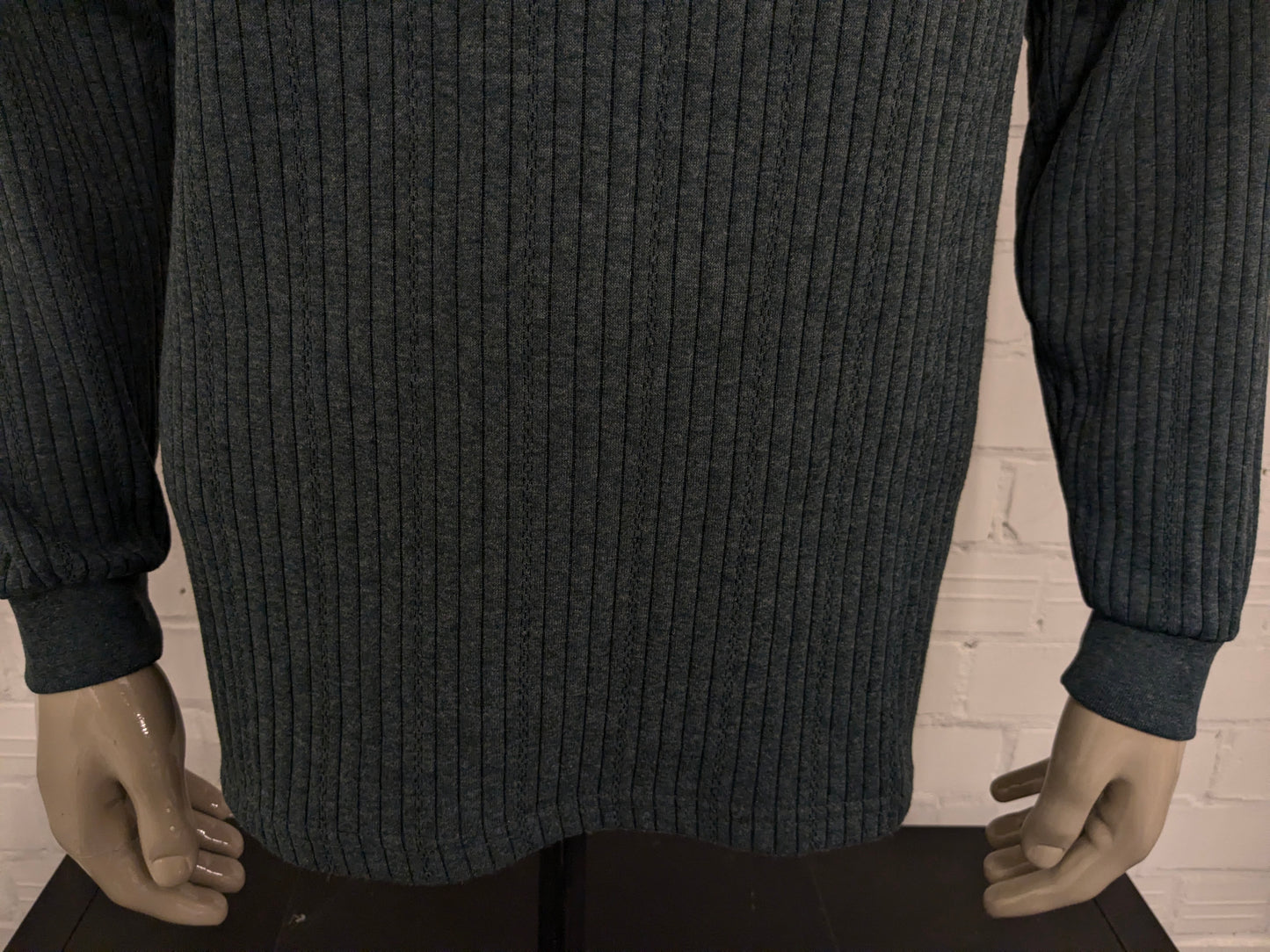 Dat's Creation trui. Groen gemêleerd. Maat L.