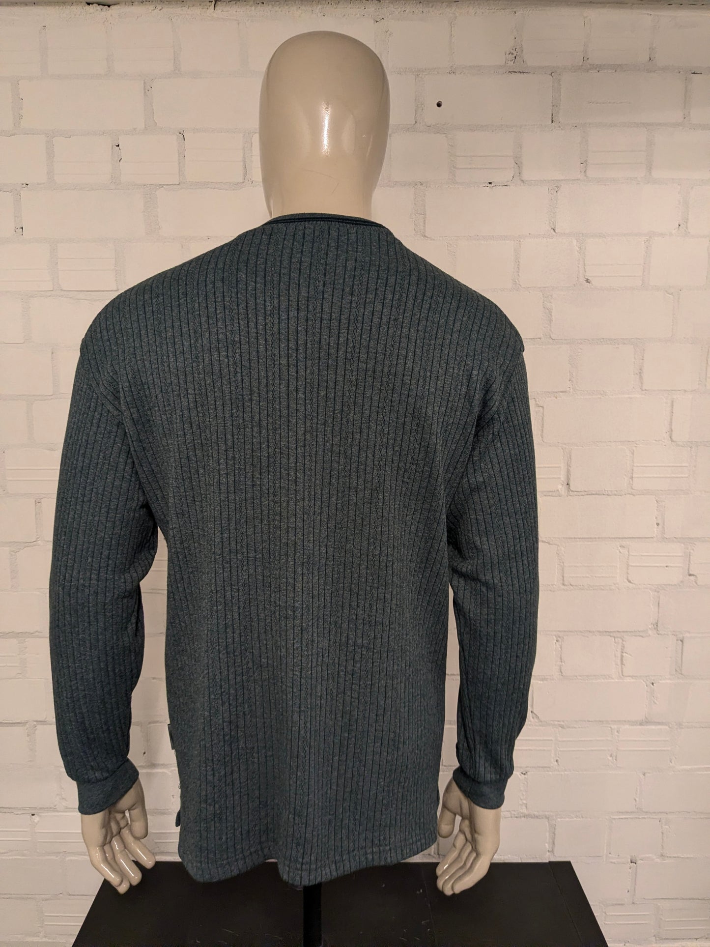 Dat's Creation trui. Groen gemêleerd. Maat L.