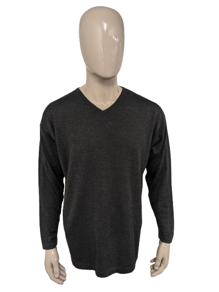 Pull en laine mérinos Fruit of the Loom avec col en V. Gris foncé mélangé. Taille XL. 60% Laine.