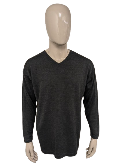 Pull en laine mérinos Fruit of the Loom avec col en V. Gris foncé mélangé. Taille XL. 60% Laine.