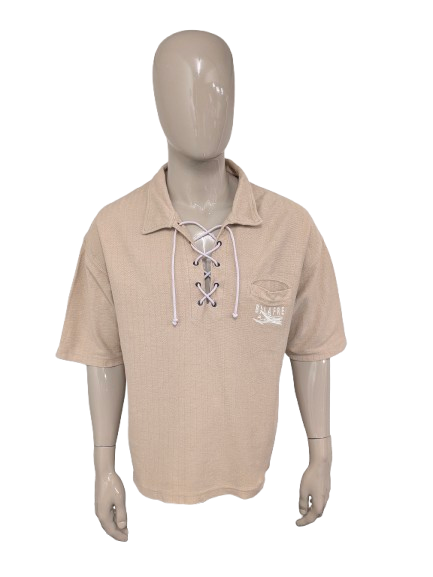 Vintage Balafre polo met touwtjes. Beige gekleurd. Maat 2XL / XXL.