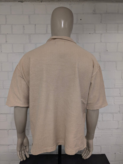 Vintage Balafre polo met touwtjes. Beige gekleurd. Maat 2XL / XXL.