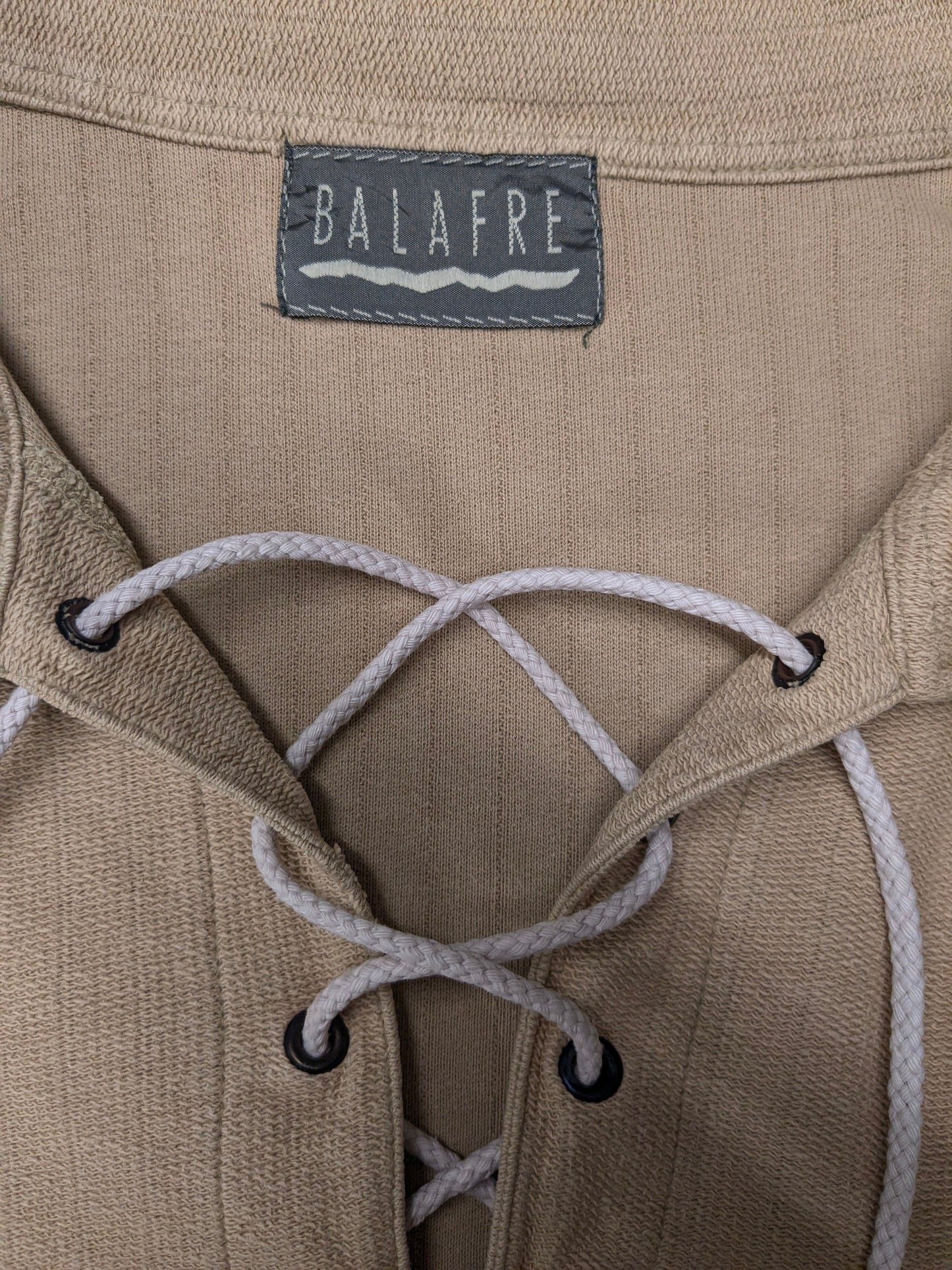 Vintage Balafre polo met touwtjes. Beige gekleurd. Maat 2XL / XXL.