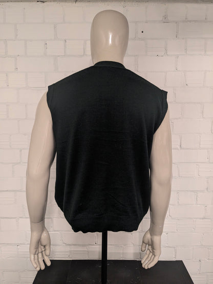 Spencer / cardigan en laine Castello vintage avec de beaux boutons. De couleur gris vert. Taille XL.