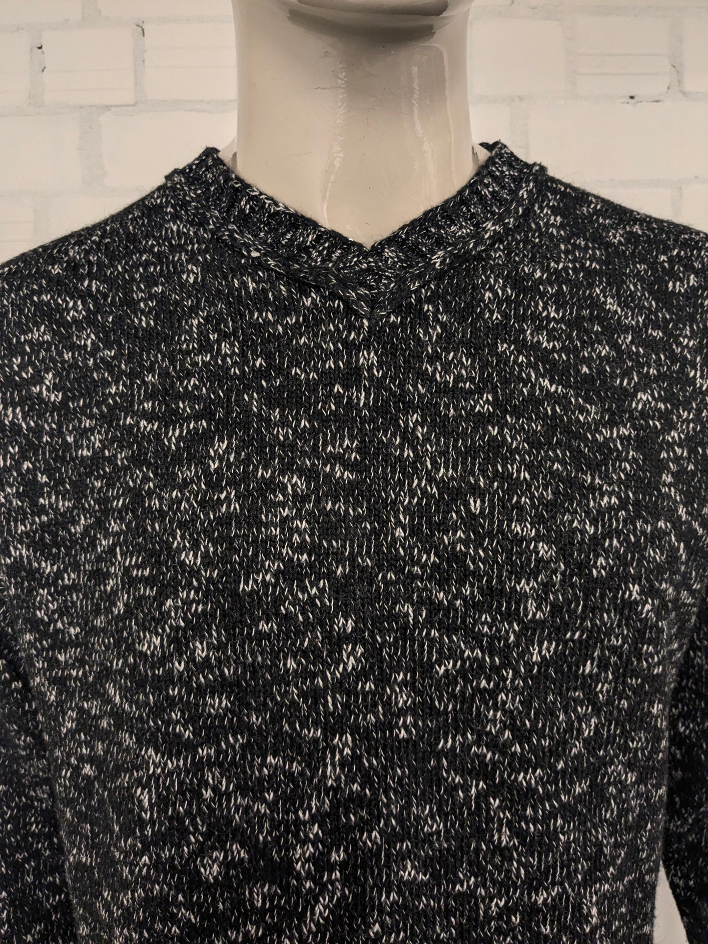 Vintage NHP sweater with V-neck. Black and white mixed. Size L.