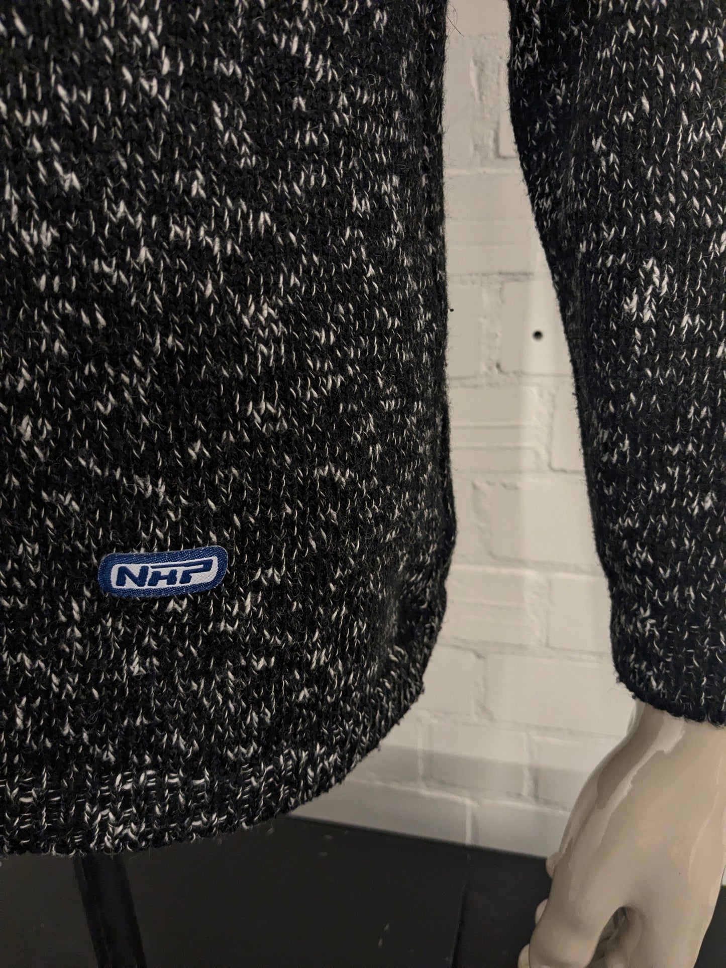 Vintage NHP sweater with V-neck. Black and white mixed. Size L.