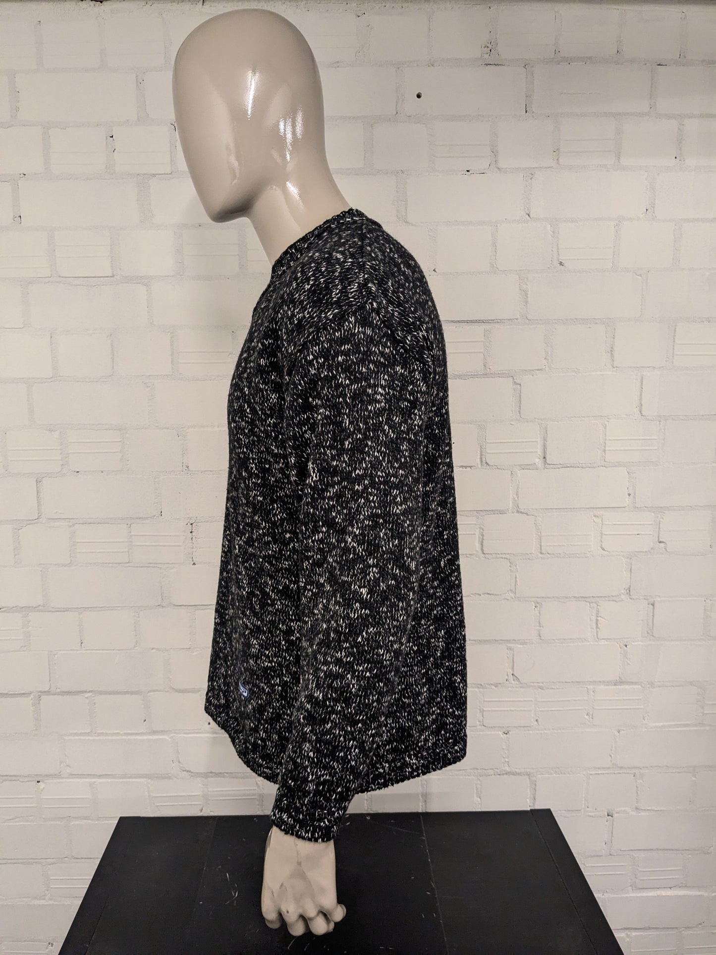 Vintage NHP sweater with V-neck. Black and white mixed. Size L.