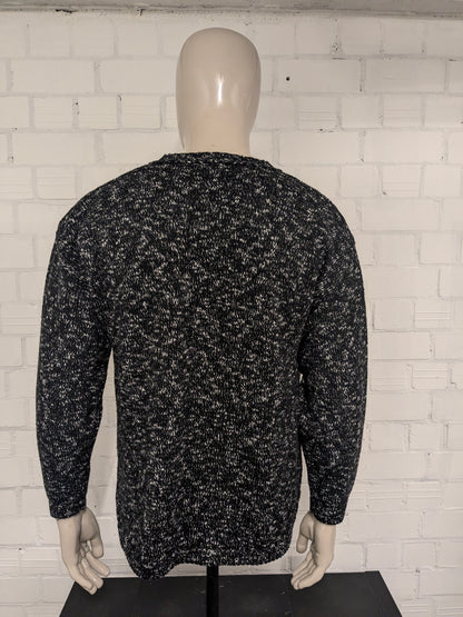Vintage NHP sweater with V-neck. Black and white mixed. Size L.