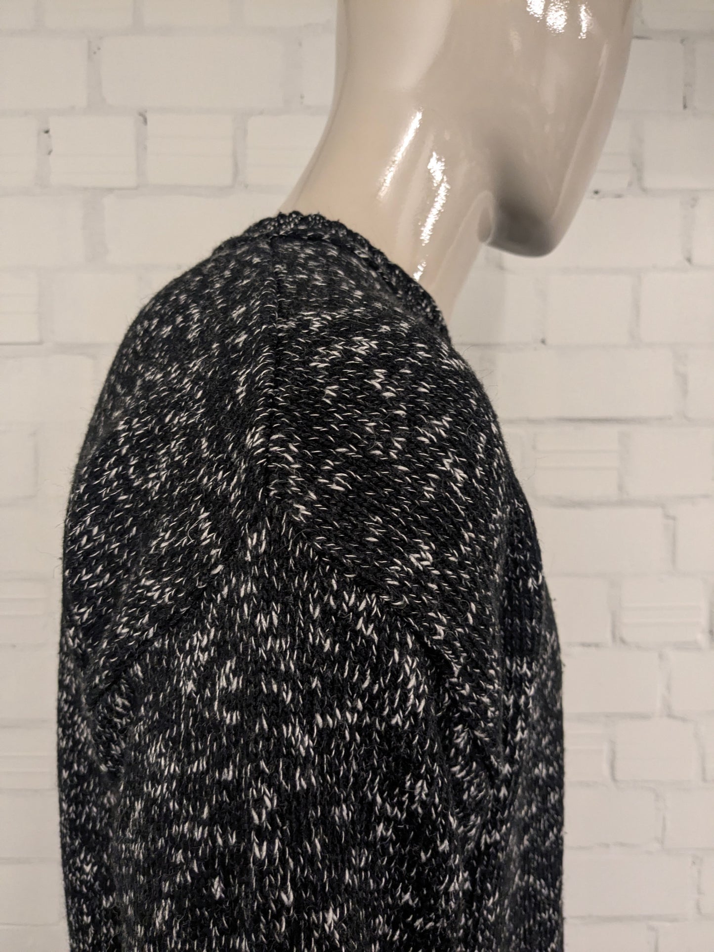 Vintage NHP sweater with V-neck. Black and white mixed. Size L.