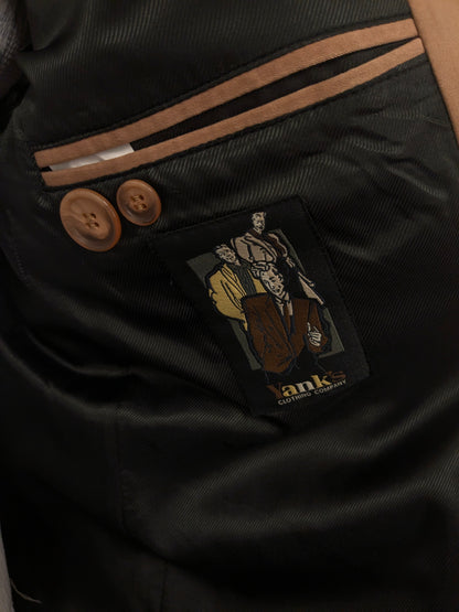 Fantástica chaqueta Vintage Yankees. Color camello claro brillante. Talla 50/M.