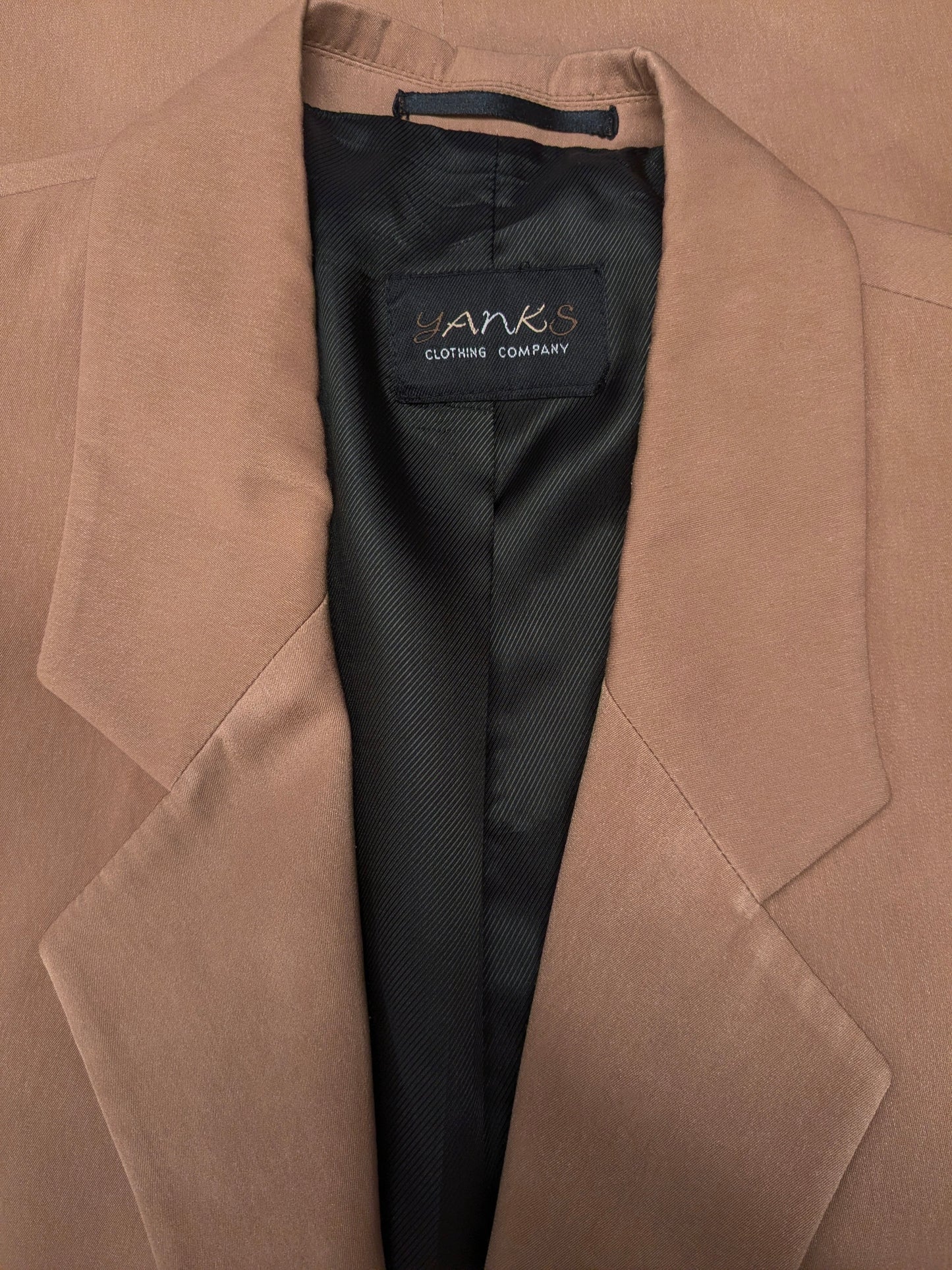 Fantástica chaqueta Vintage Yankees. Color camello claro brillante. Talla 50/M.