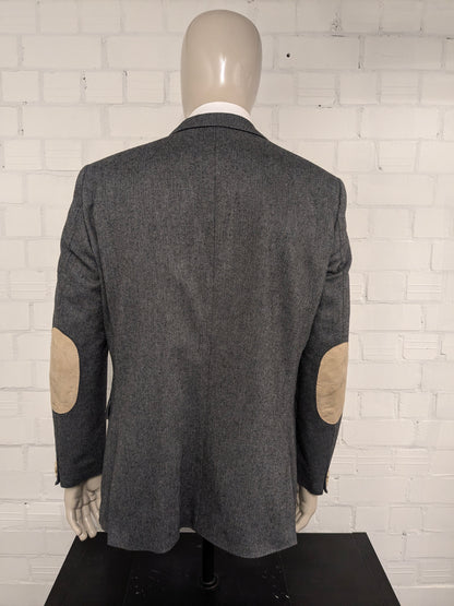 Jaguar Wollen colbert met suède elleboogstukken. Zwart Grijs visgraat motief. Maat 56 / XL.