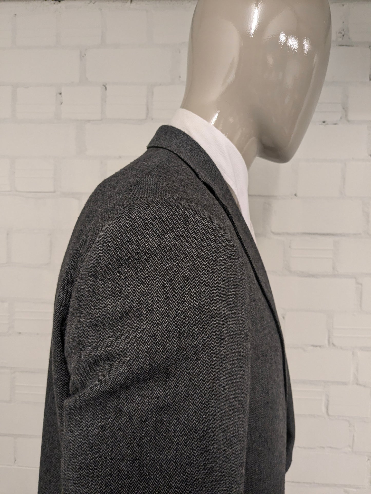 Jaguar Wollen colbert met suède elleboogstukken. Zwart Grijs visgraat motief. Maat 56 / XL.