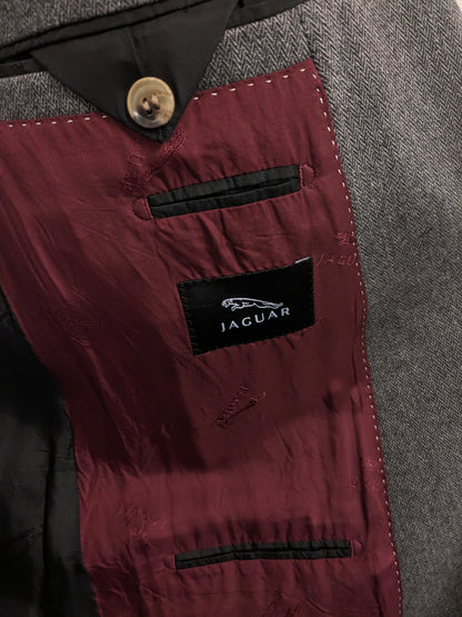 Jaguar Wollen colbert met suède elleboogstukken. Zwart Grijs visgraat motief. Maat 56 / XL.