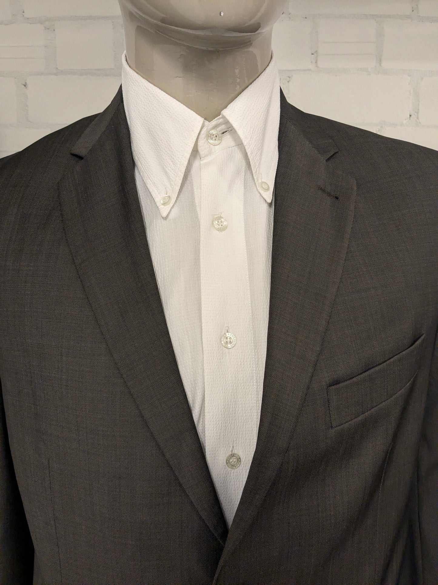 Merkloos Wollen kostuum. Bruin motief. Maat 26 (52 / L).