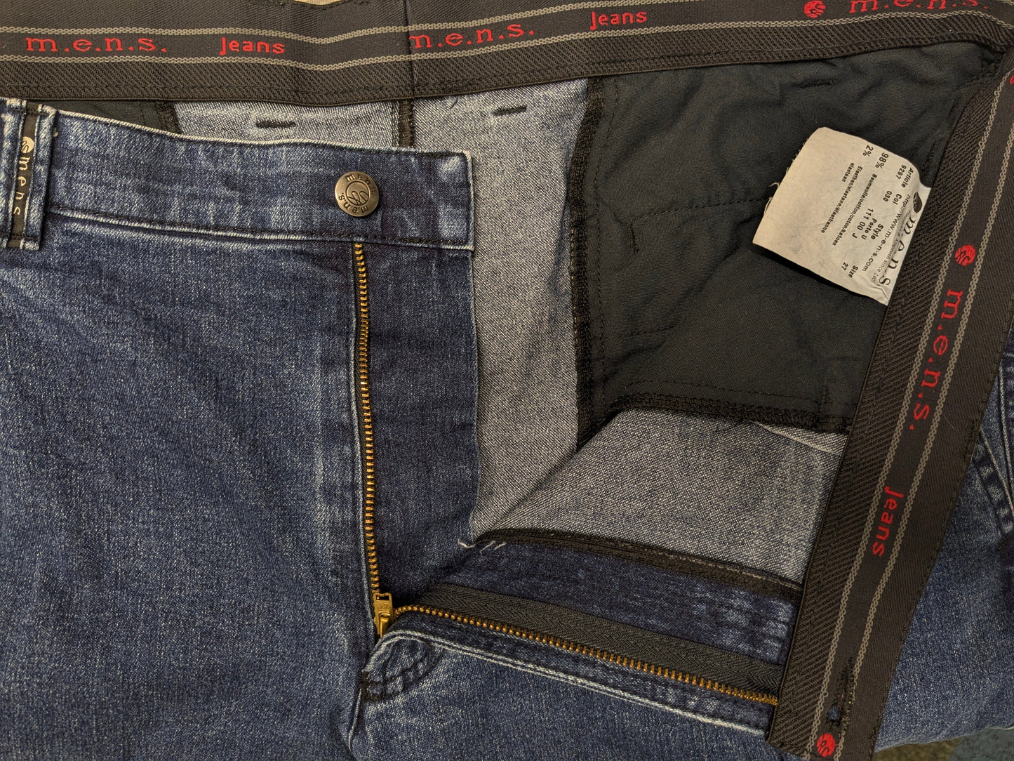 M.E.N.S. jeans broek. Blauw gekleurd. Maat 27 (54 / L).