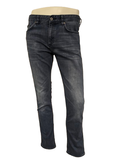 Boss Hugo Boss jeans. Donker Blauw gekleurd. Maat W34 - L32. type Delaware Slim Fit. stretch.