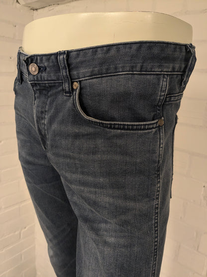 Boss Hugo Boss jeans. Donker Blauw gekleurd. Maat W34 - L32. type Delaware Slim Fit. stretch.