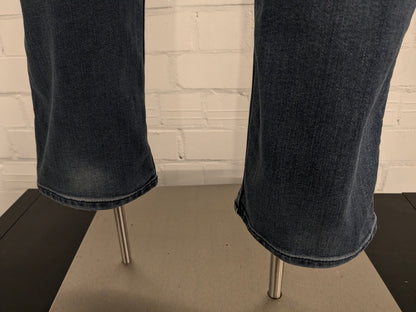 Boss Hugo Boss jeans. Donker Blauw gekleurd. Maat W34 - L32. type Delaware Slim Fit. stretch.