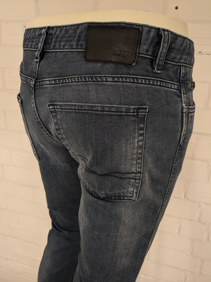 Boss Hugo Boss jeans. Donker Blauw gekleurd. Maat W34 - L32. type Delaware Slim Fit. stretch.