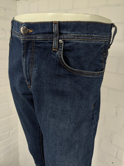 Corneliani ID jeans. Donker Blauw gekleurd. Maat W34 - L36. stretch.