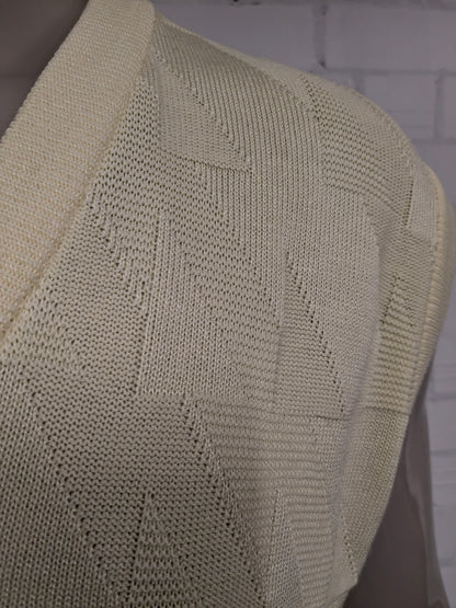 Vintage Mäser spencer met V-Hals. Geel motief. Maat L.