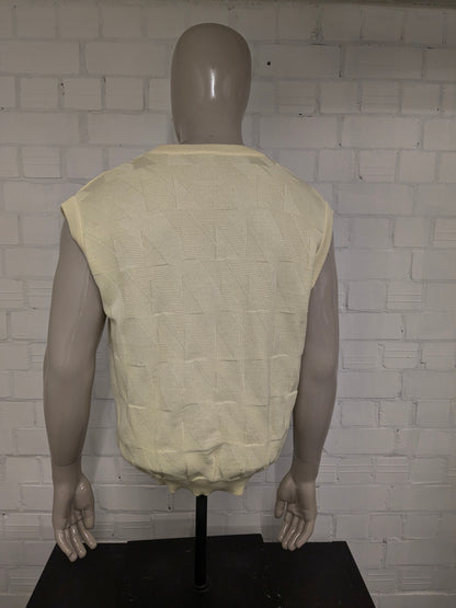 Vintage Mäser spencer met V-Hals. Geel motief. Maat L.