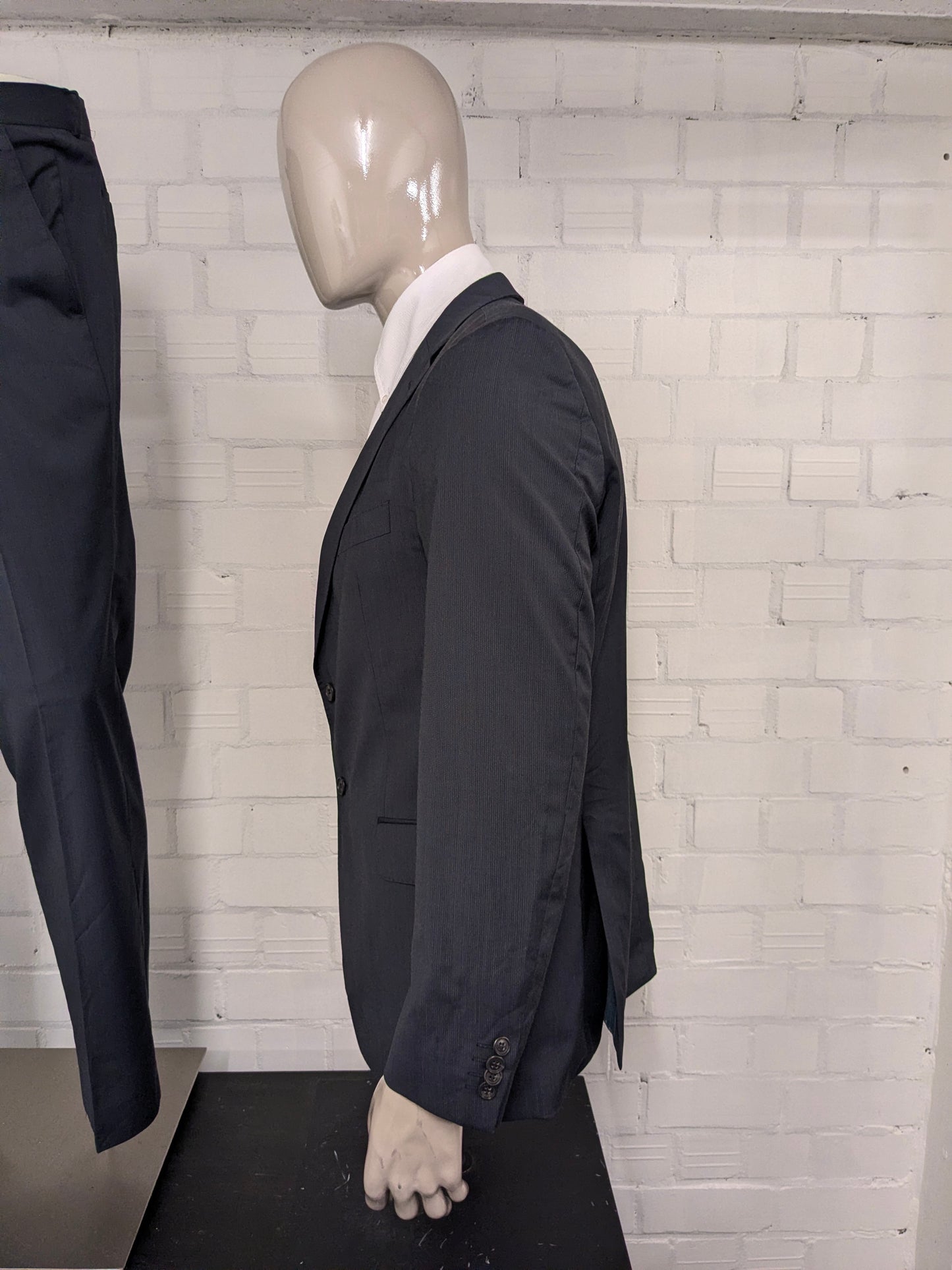 Tommy Hilfiger Tailored kostuum. Grijs Blauw gestreept motief. Maat 52 / L.  super 100's.