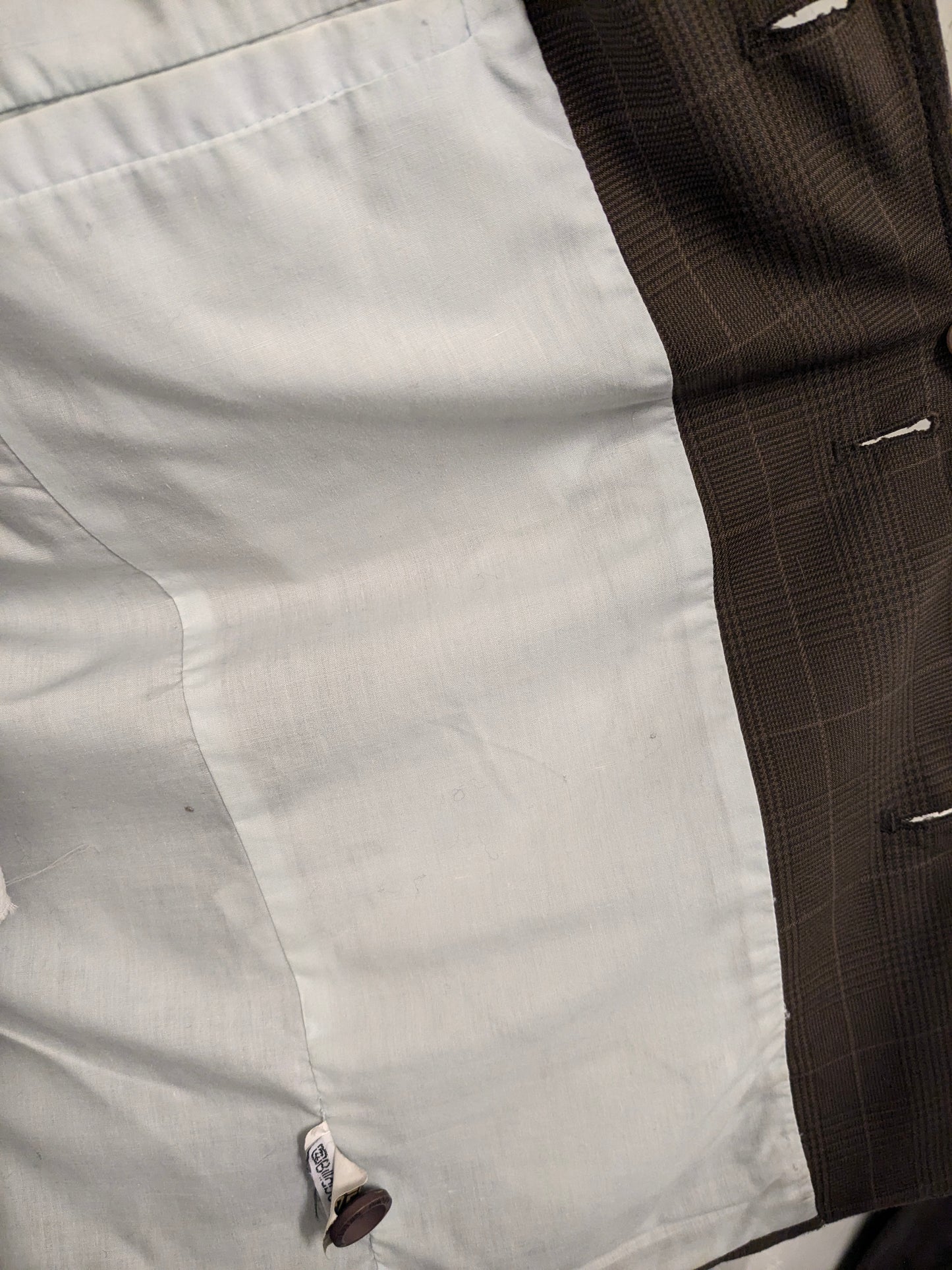 Casual Billabong colbert. Bruin geruit met kleur accenten linker mouw. Maat L.