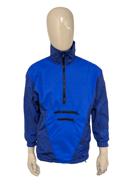 Vintage sport trui met schoudervullingen. Blauw Zwart gekleurd. Maat L.