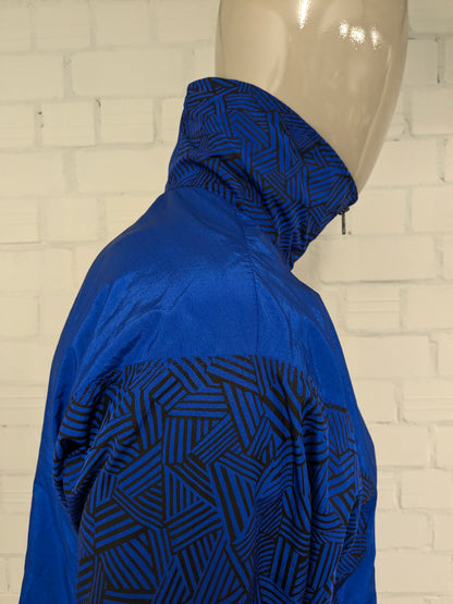 Vintage sport trui met schoudervullingen. Blauw Zwart gekleurd. Maat L.