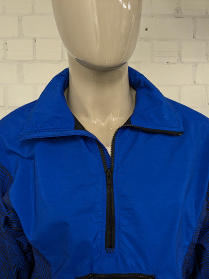 Vintage sport trui met schoudervullingen. Blauw Zwart gekleurd. Maat L.