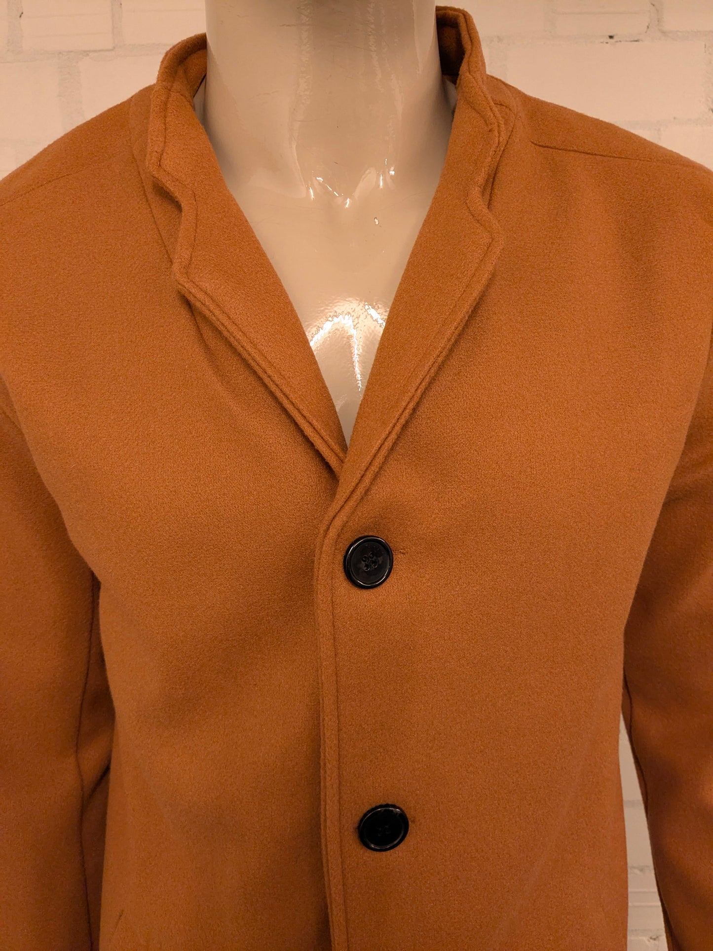 Flex Supply half lange mantel. Bruin gekleurd. Maat S.