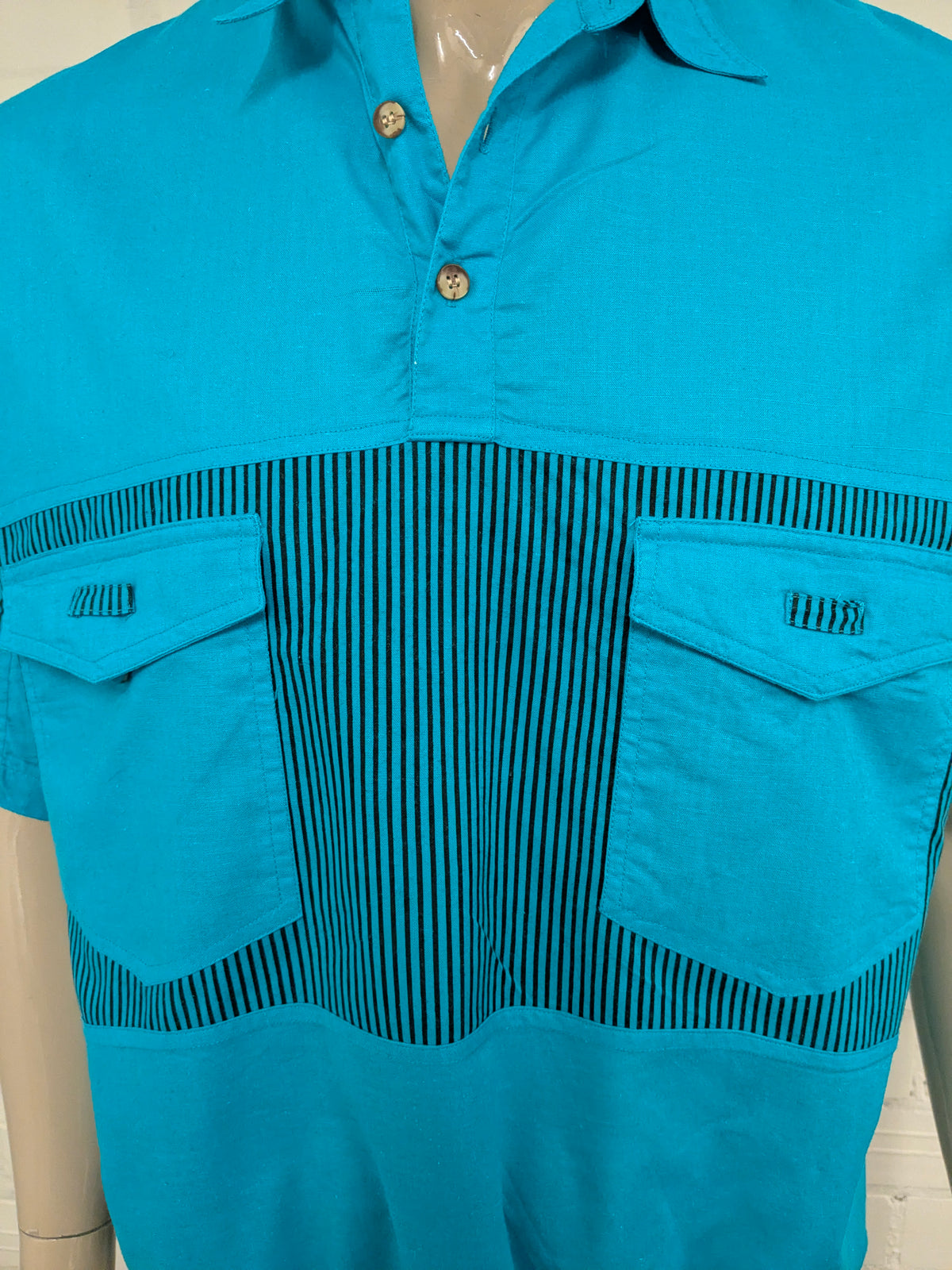 Vintage Street Rag Polo mit elastischem Band. Blau mit Aufdruck. Größe XL.