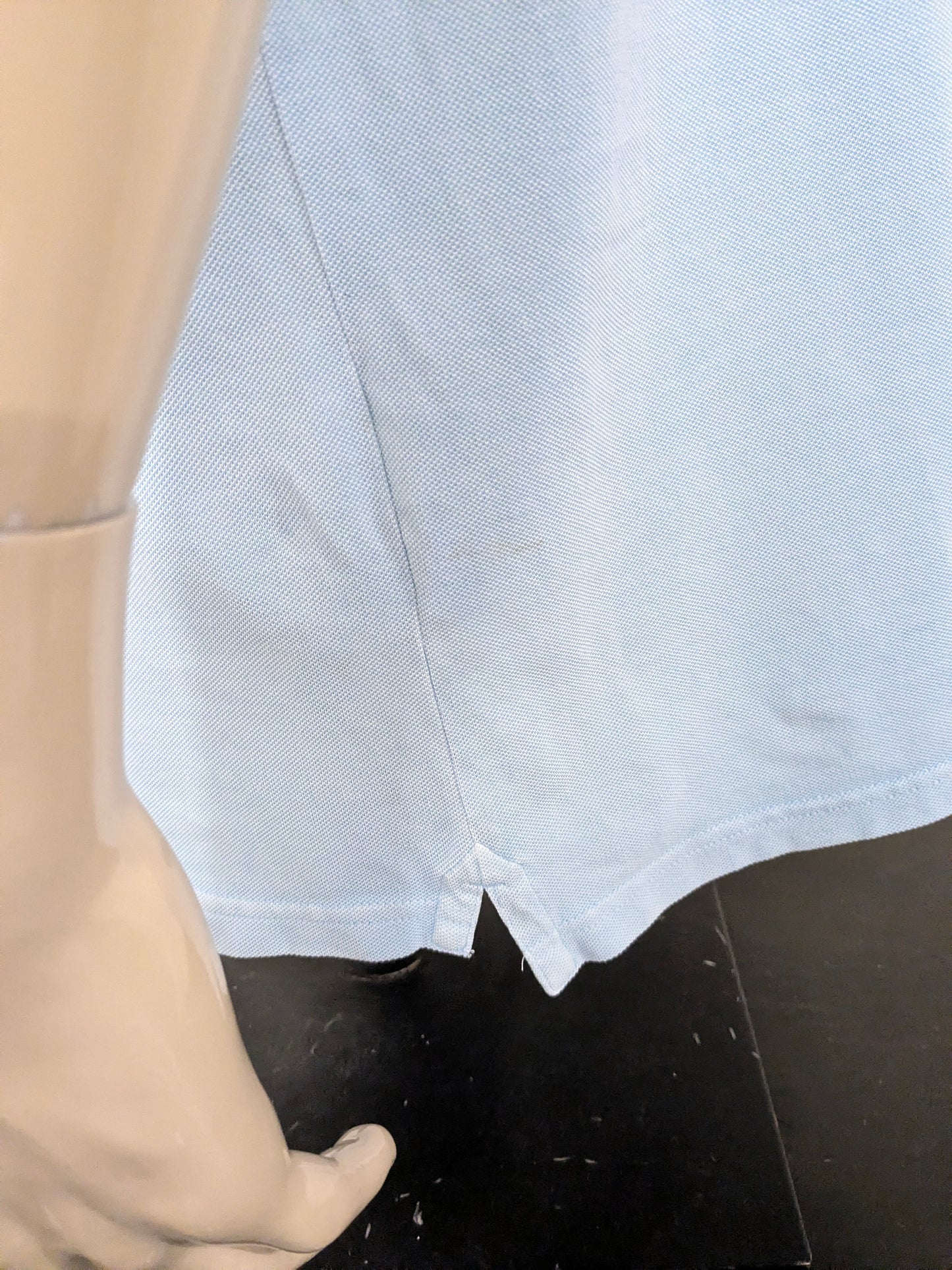 State of Art polo. Licht Blauw gekleurd. Maat 2XL / XXL.