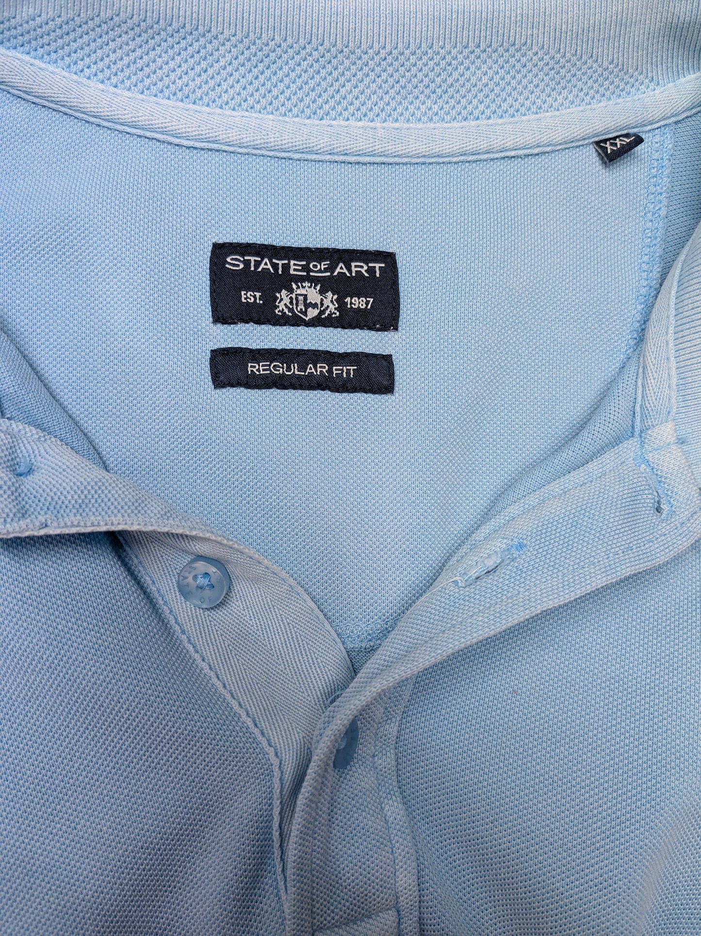 State of Art polo. Licht Blauw gekleurd. Maat 2XL / XXL.