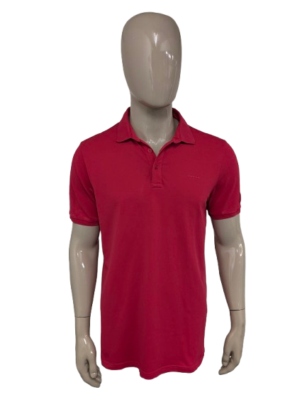 Polo de última generación. Color rosa oscuro. Talla L.