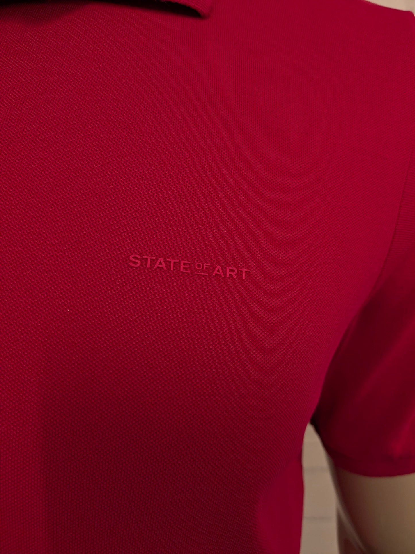 State of Art polo. Donker Roze gekleurd. Maat L.