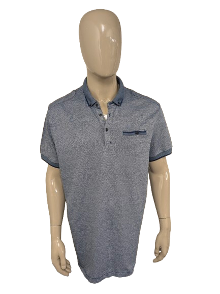 Vanguard polo. Blauw gekleurd motief. Maat 3XL / XXXL.