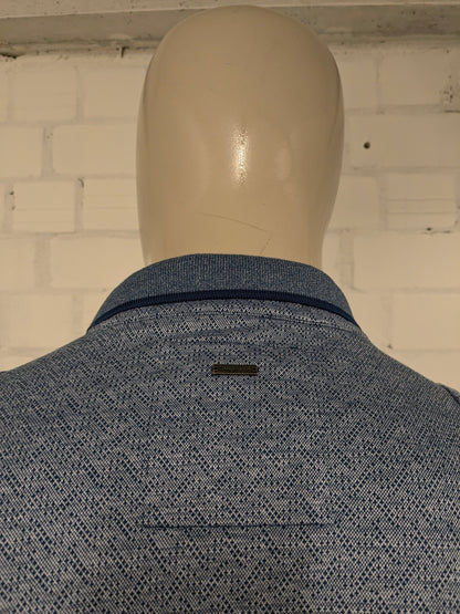 Vanguard polo. Blauw gekleurd motief. Maat 3XL / XXXL.