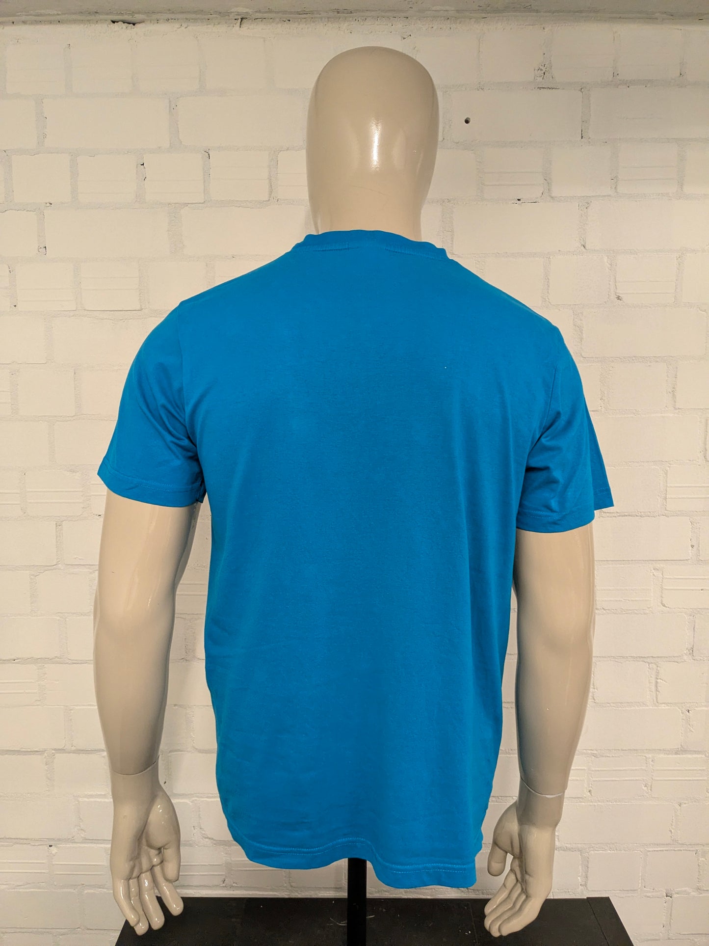 Ellesse shirt. Blauw met opdruk. Maat L.
