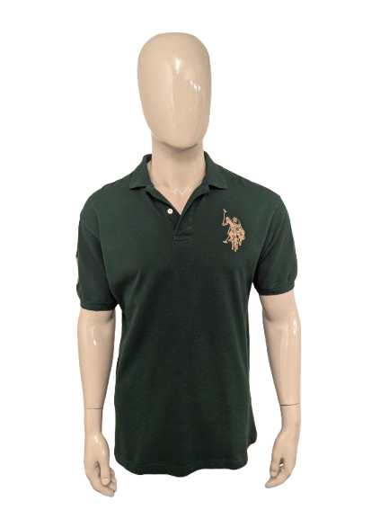 Polo de la Asociación de Polo de EE. UU. Color verde oscuro. Talla L.