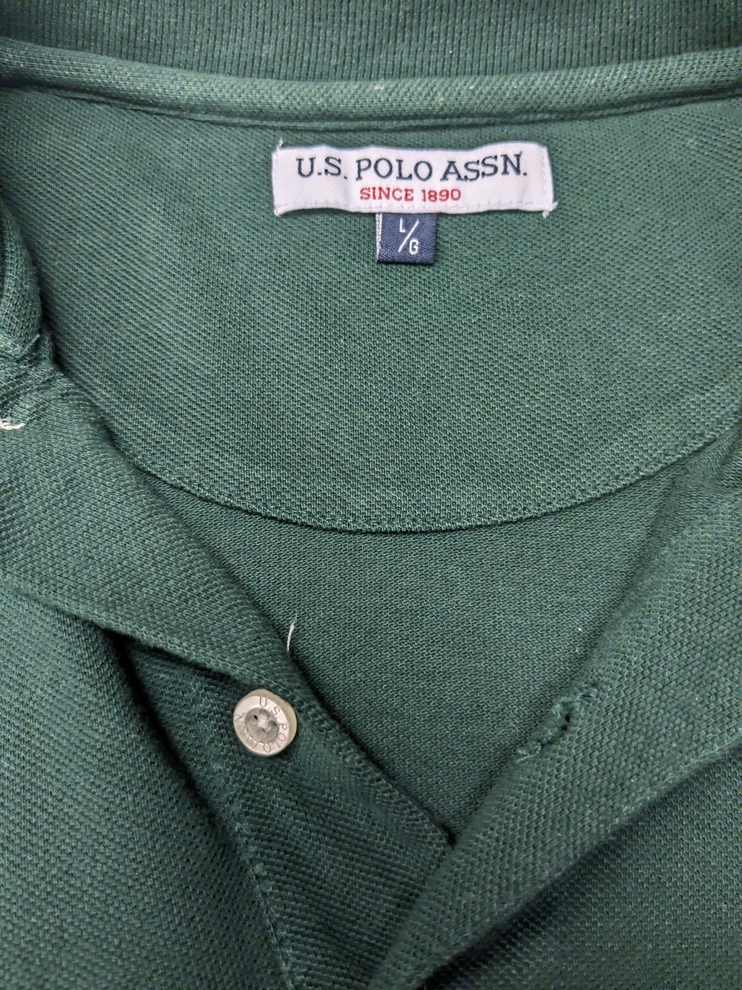 U.S. Polo Assn polo. Donker Groen gekleurd. Maat L.
