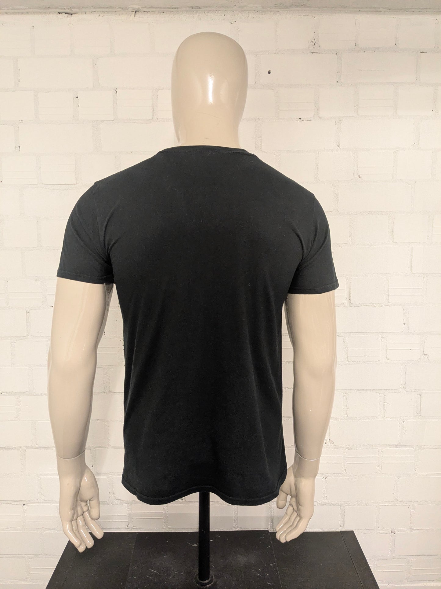 Rick and Morty shirt. Zwart met opdruk. Maat M.