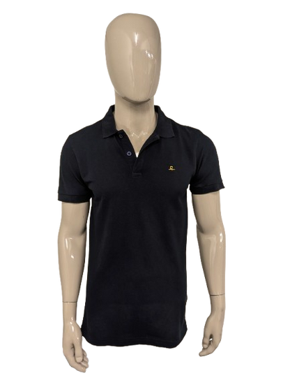 Nomad polo. Donker Blauw gekleurd. Maat M.