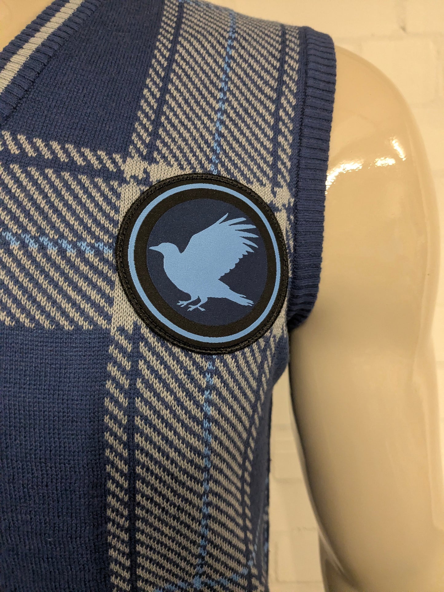 Harry Potter Wizarding Wordl "Ravenclaw" spencer met V-Hals. Blauw Grijs geruit. Maat S.