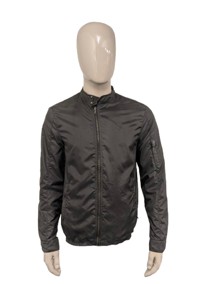 Replay zomer jack. Donker Grijs gekleurd. Dubbele rits waardoor pasvorm aan te passen is. Maat L.