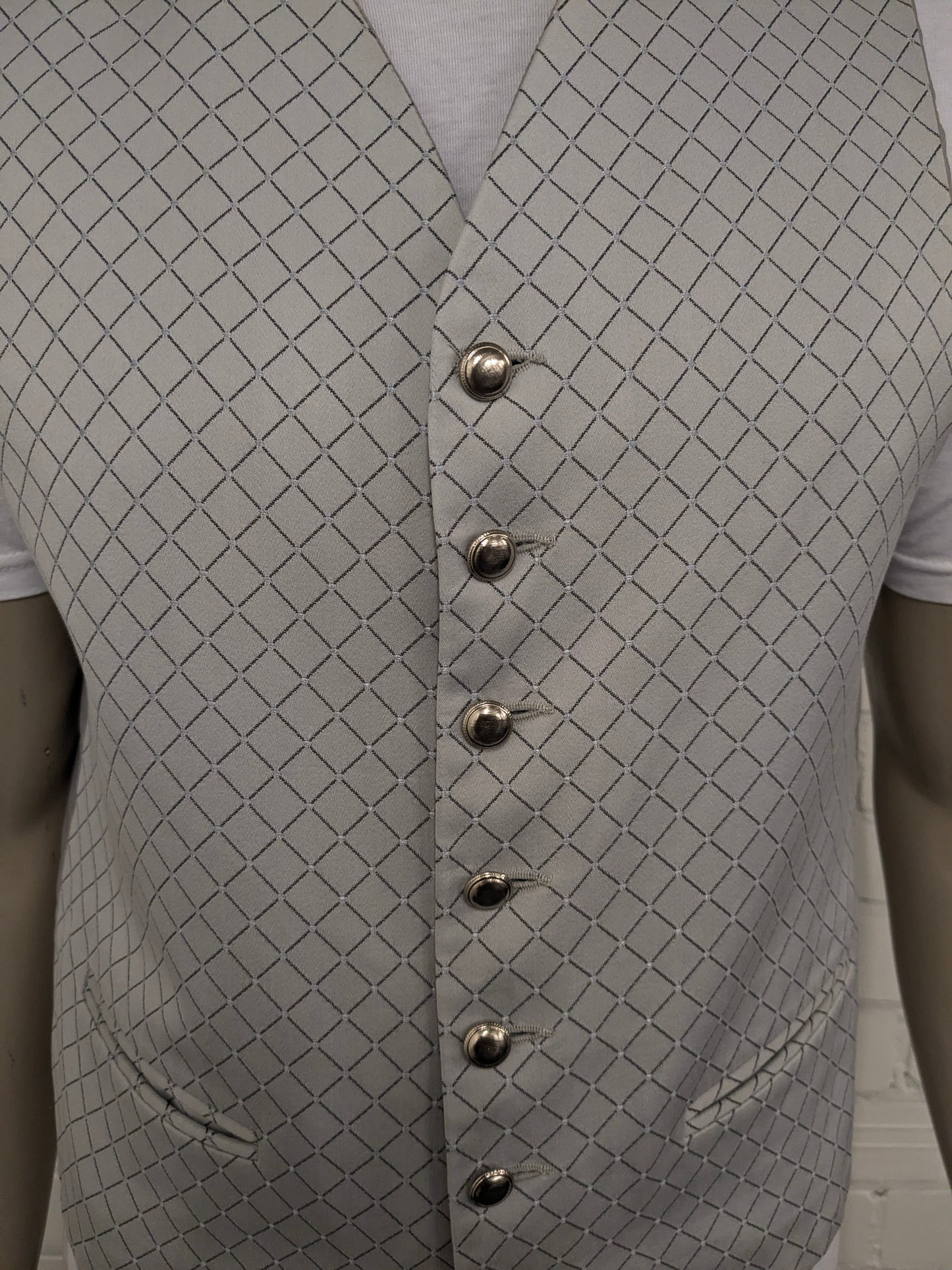 Pronuptia gilet. Grijs motief. Maat L.