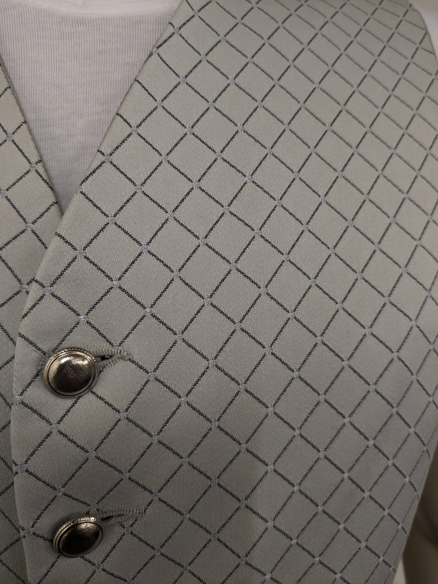 Pronuptia gilet. Grijs motief. Maat L.